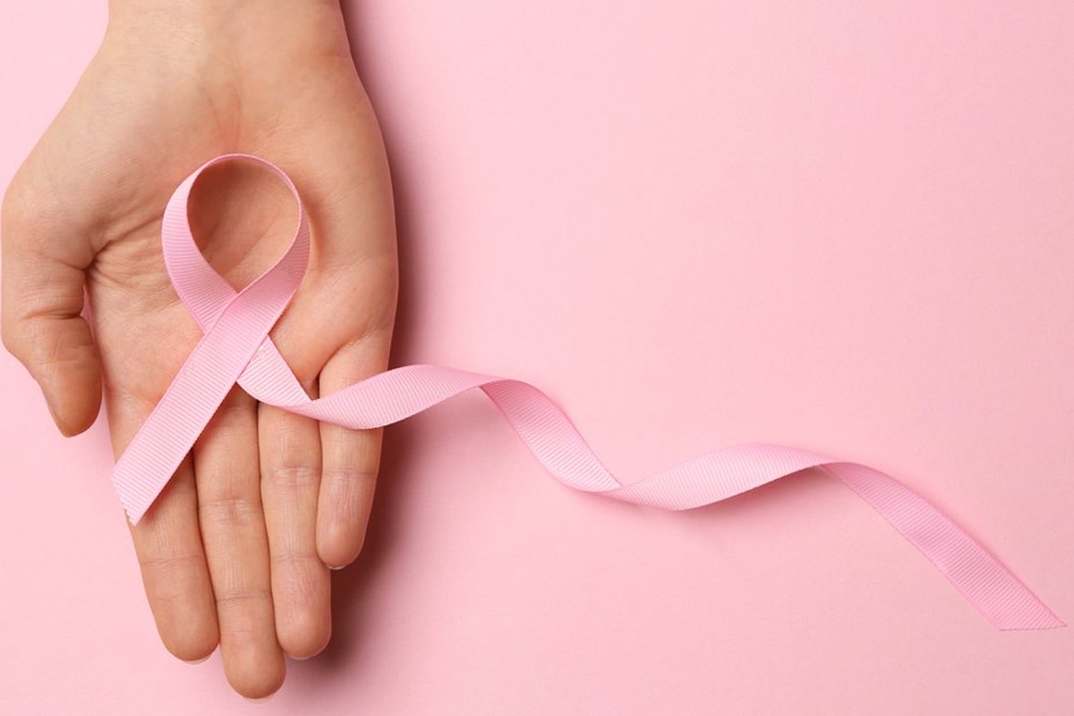 Milani evento Welfare - mano con nastro rosa